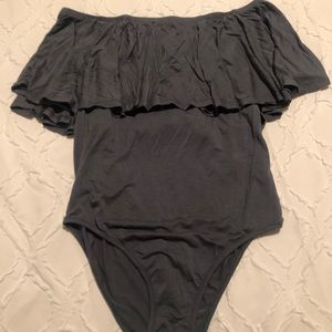 Bodysuit with off shoulder ruffle. New!